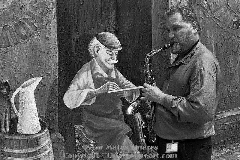 "The Player in Old Town" - Street Photography